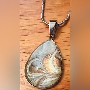 Elegant Teardrop Pendant Necklace with matching earrings